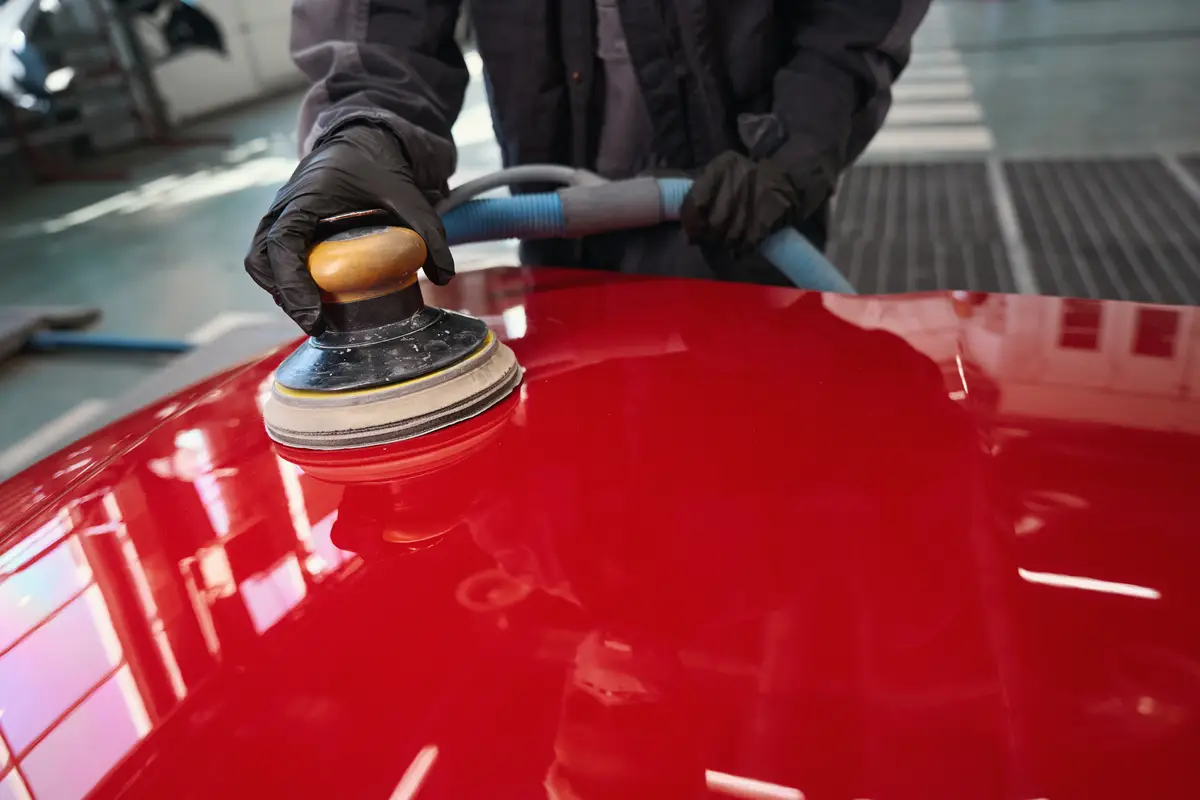 view-of-person-hands-polishing-car-with-orbital